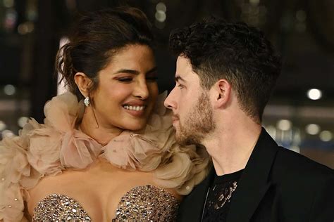 priyanka chopra topless|Priyanka Chopra Wears Nude Gown With Nick Jonas at Mumbai。